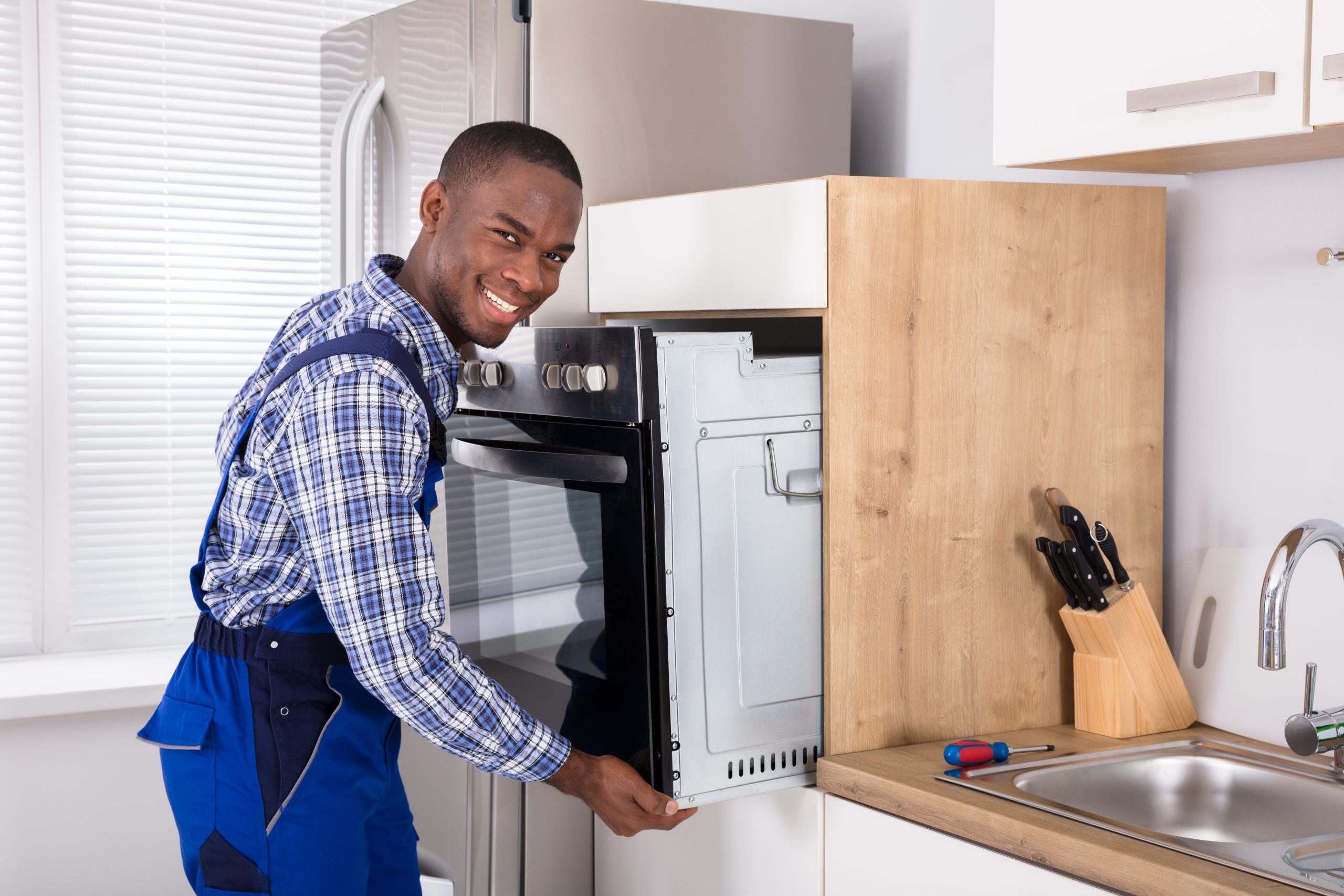 Do you need a plumber to hook up a gas stove?