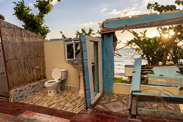 The interior of a home near the coast shows severe structural damage following Hurricane Melissa.