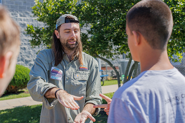 Children and volunteers gather at Good360 and Project:Camp's Built to Play distribution event in London, Kentucky, part of long-term tornado recovery efforts