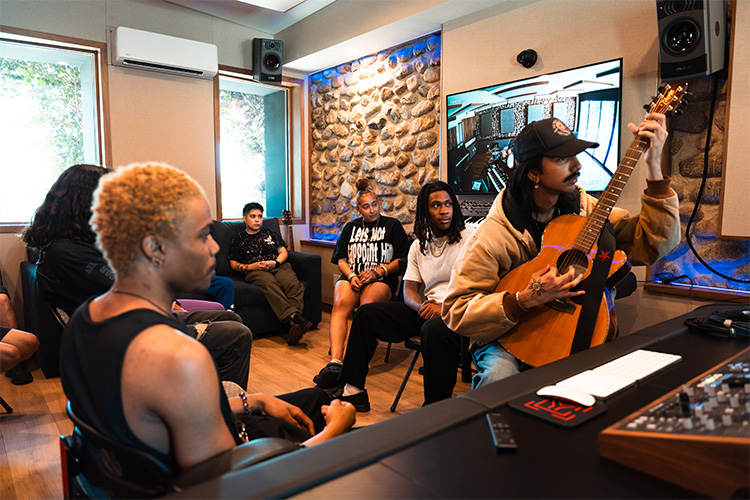 Youth gather for a music and storytelling workshop supported by Good360 and Youth Mentoring Action Network, highlighting creative program donations for nonprofits.